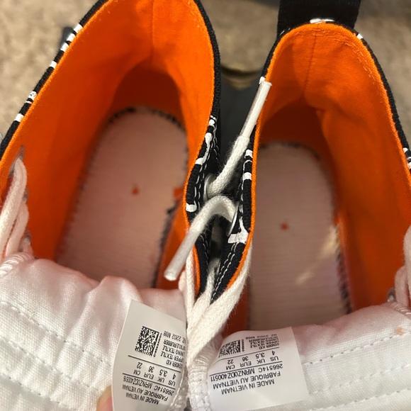 chuck by chuck converse (black white & orange)